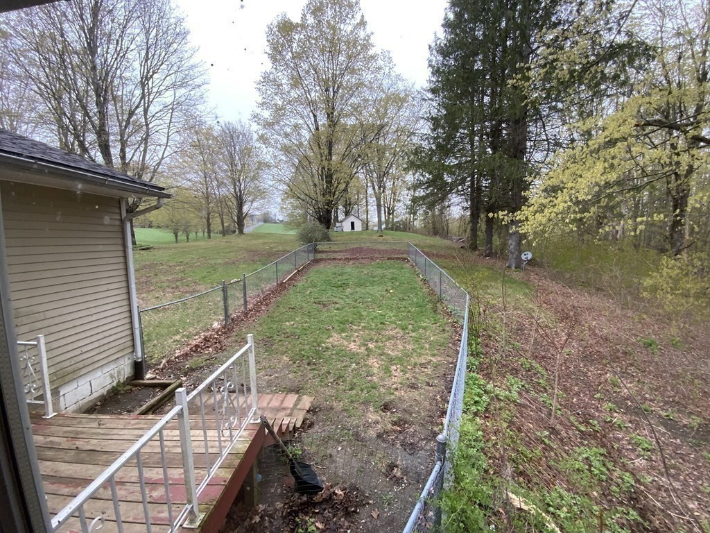 731 Greenfield Road Leyden, MA 01337 - Photo 32 of 36 a view of a backyard with large trees