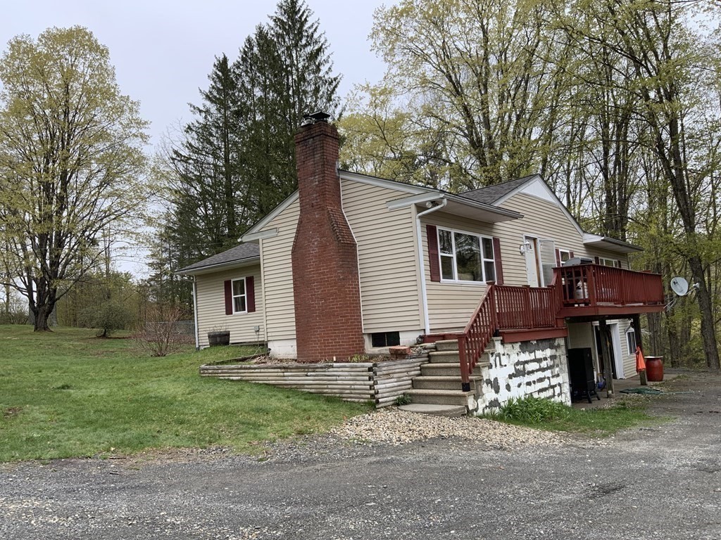 731 Greenfield Road Leyden, MA 01337 - Photo 33 of 36 a view of a house with a yard and large tree