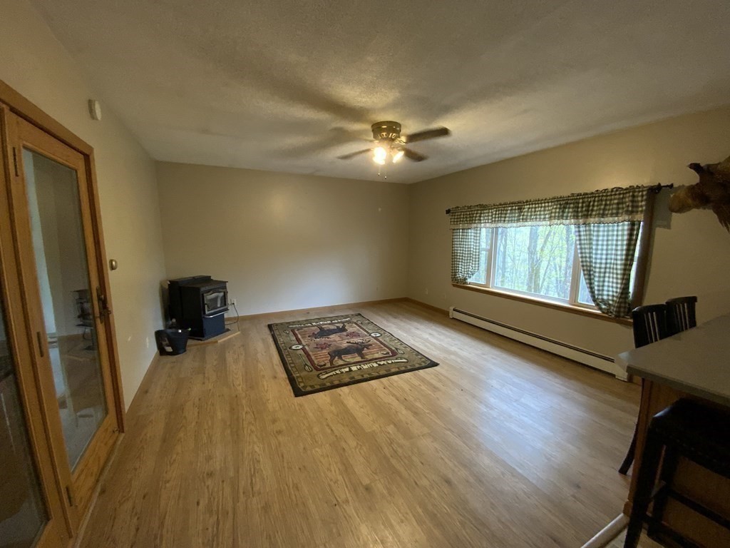 731 Greenfield Road Leyden, MA 01337 - Photo 8 of 36 a view of an empty room with a window