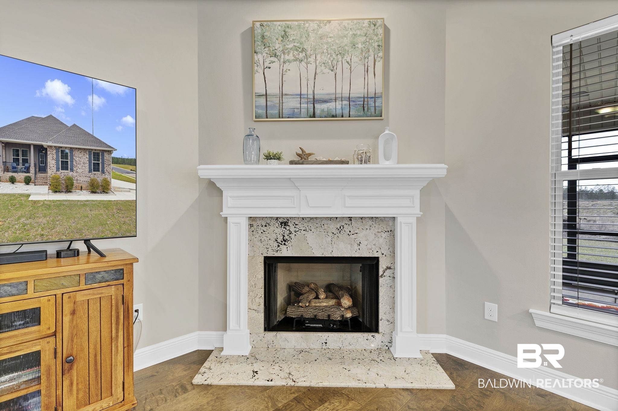 11247 Thistledown Loop Spanish Fort, AL 36527 - Photo 12 of 72 Details featuring a fireplace, baseboards, and wood finished floors