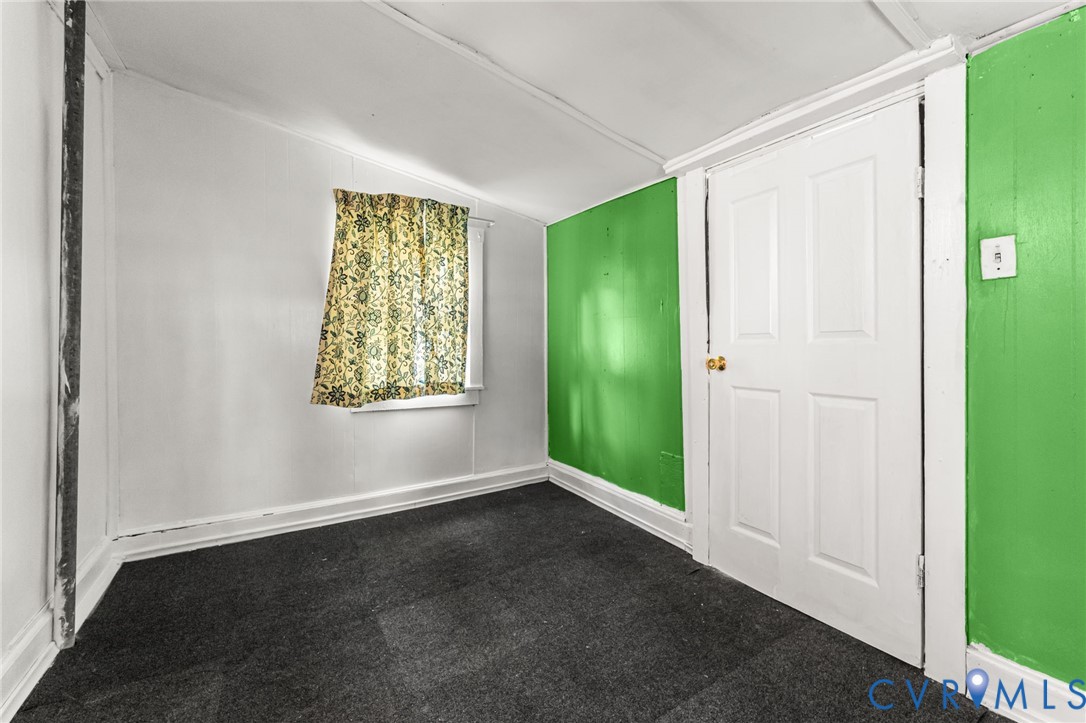2097 Coles Point Road Hague, VA 22469 - Photo 31 of 34 a view of an empty room with window and closet area