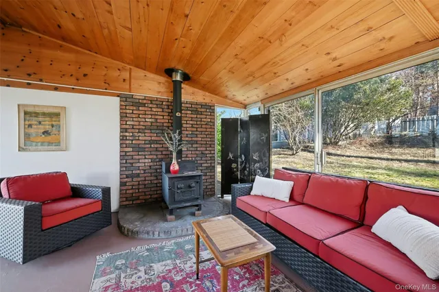 a blue chair sitting in front of a house