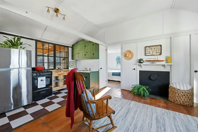 a workspace with furniture window and wooden floor