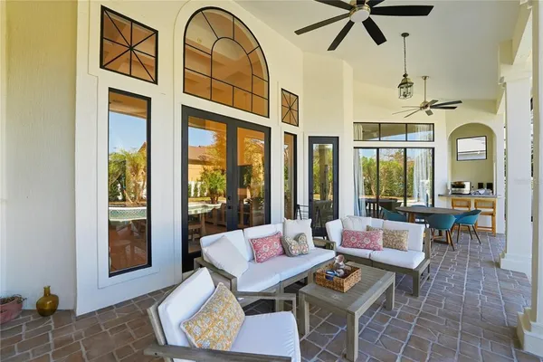 a view of a swimming pool with a lounge chairs
