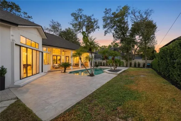 a view of a house with swimming pool