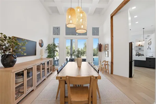 a view of a dining room with furniture window and flowerpot