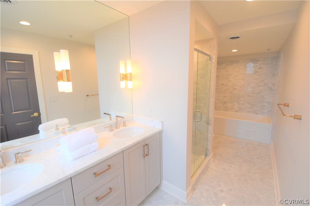 413 Stuart Circle, Unit 5B Richmond, VA 23220 - Photo 11 of 34 Stunning Master Bath with dual vanities and beauti