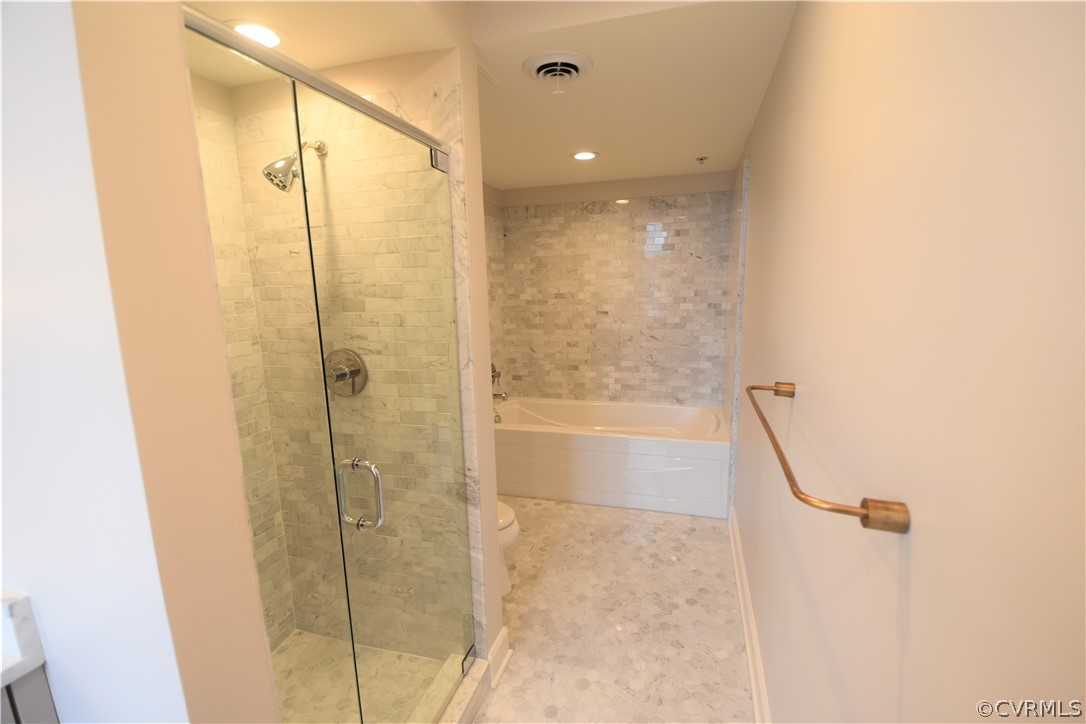 413 Stuart Circle, Unit 5B Richmond, VA 23220 - Photo 12 of 34 More detail of the shower and tub in Master Bath.