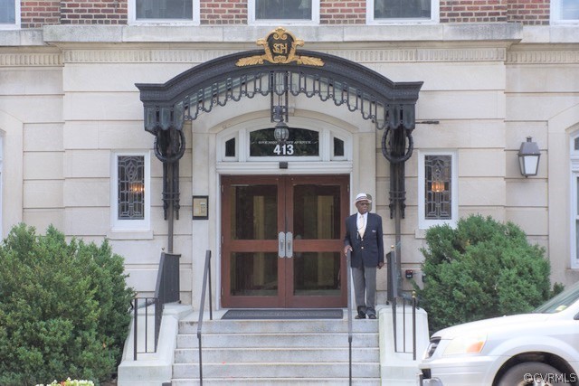 413 Stuart Circle, Unit 5B Richmond, VA 23220 - Photo 2 of 34 The doorman greets you and helps you with your eve