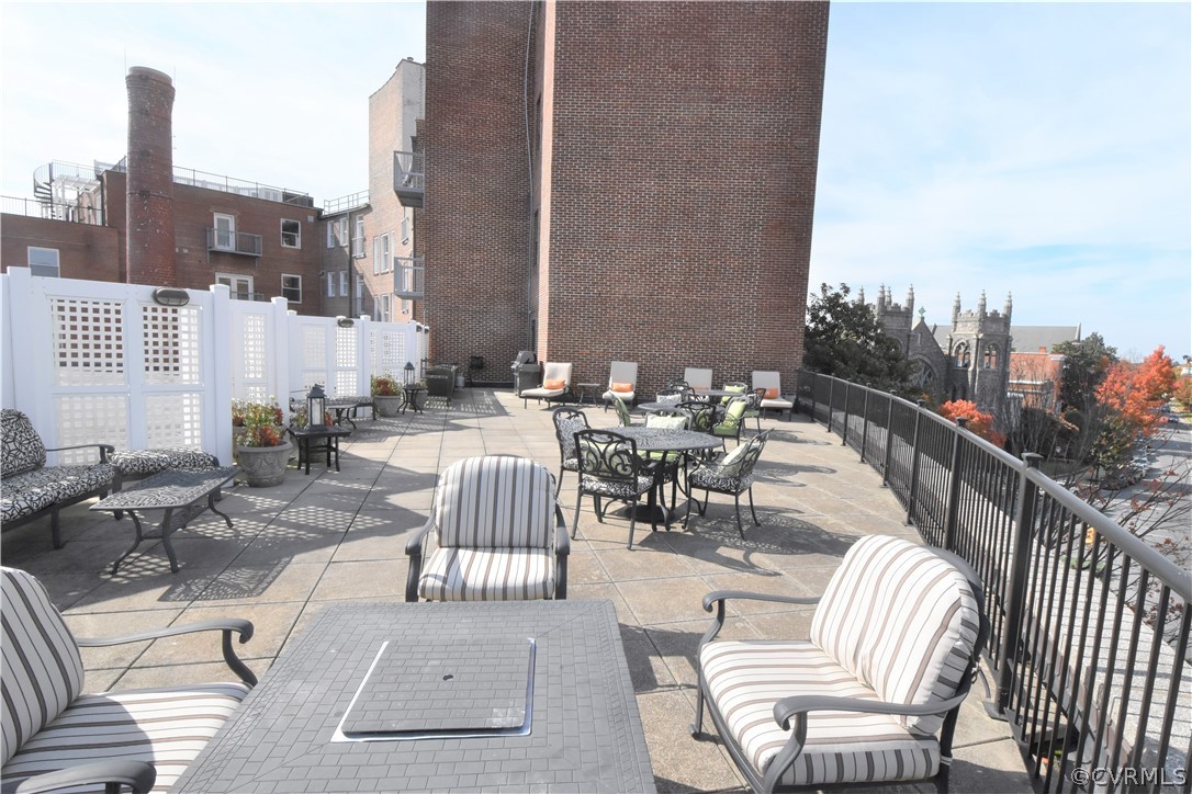 413 Stuart Circle, Unit 5B Richmond, VA 23220 - Photo 27 of 34 Another view of the Rooftop deck (new furniture an