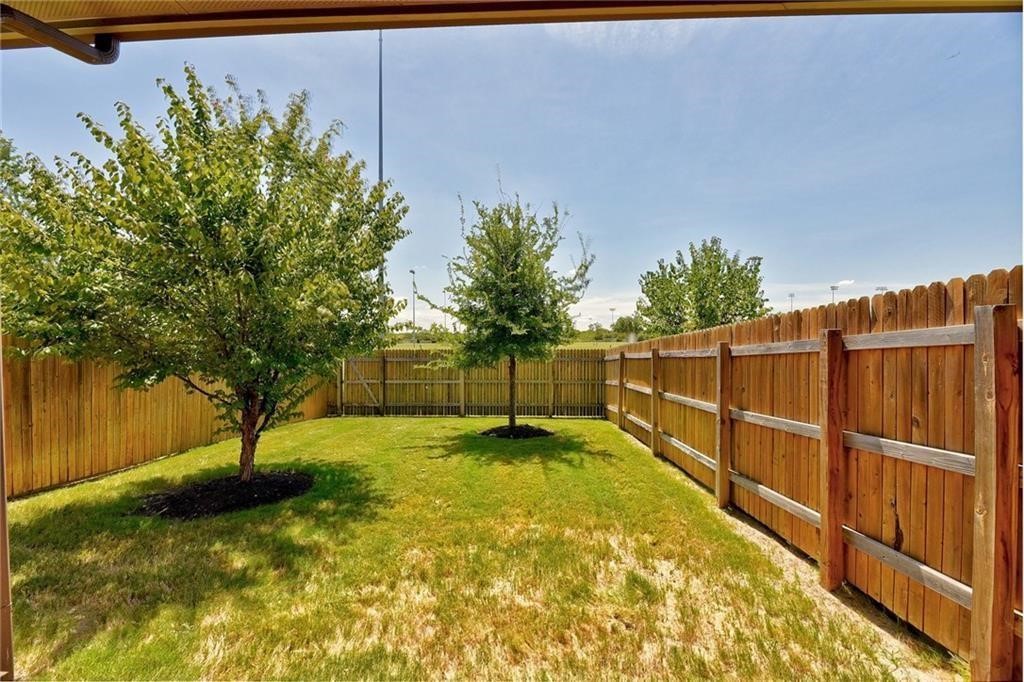 13400 Briarwick Drive, Unit 2502 Austin, TX 78729 - Photo 17 of 20 a view of a backyard