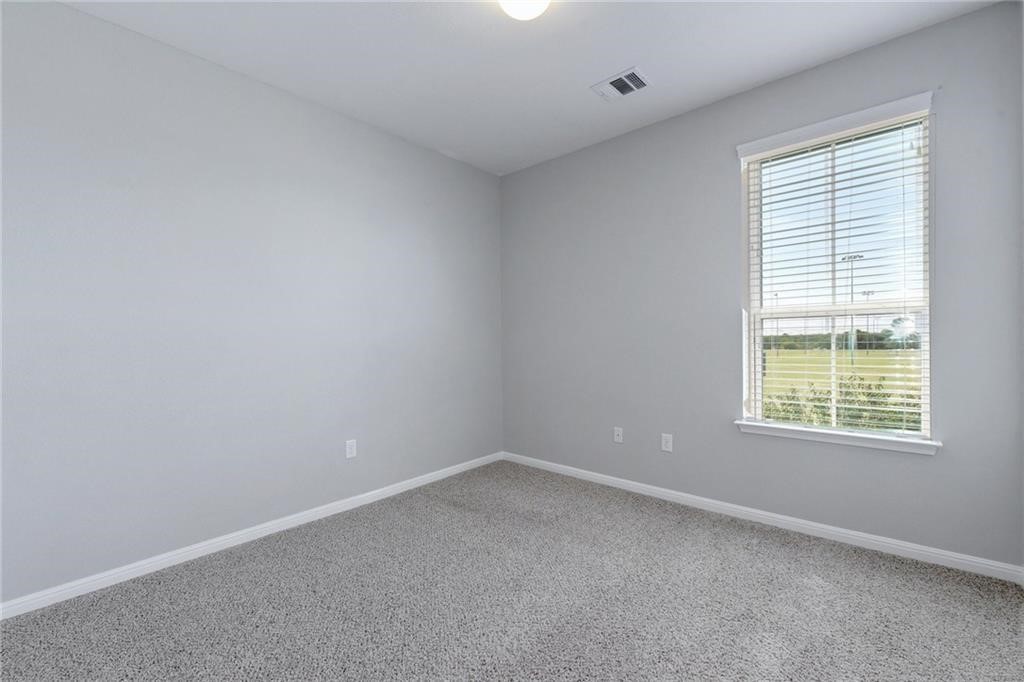 13400 Briarwick Drive, Unit 2502 Austin, TX 78729 - Photo 9 of 20 an empty room with a window
