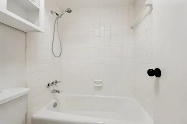 a bathroom with a bathtub