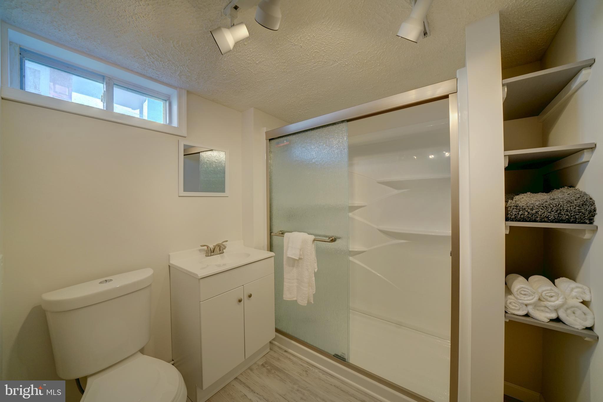242 Carroll Road Pasadena, MD 21122 - Photo 19 of 39 Newly remodeled lower level bathroom