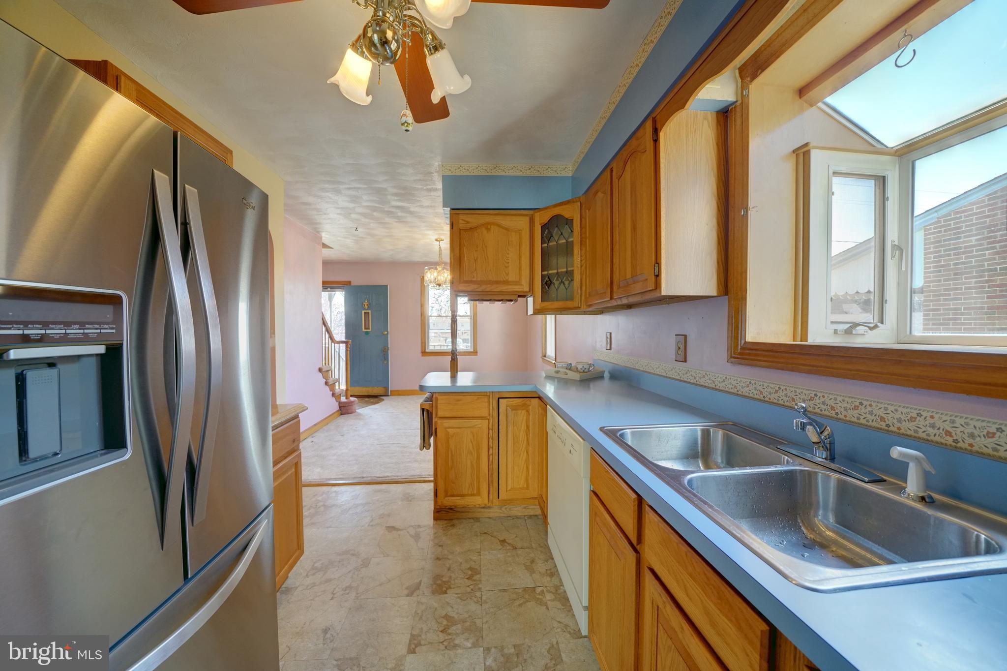 242 Carroll Road Pasadena, MD 21122 - Photo 5 of 39 Kitchen w/planter box and huge counter space.