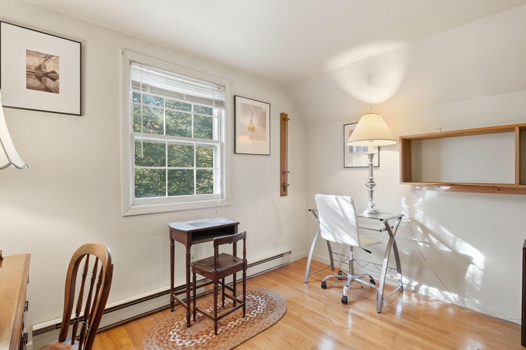28 Collingwood Road Springfield, MA 01119 - Photo 20 of 32 a view of a workspace with furniture and a window