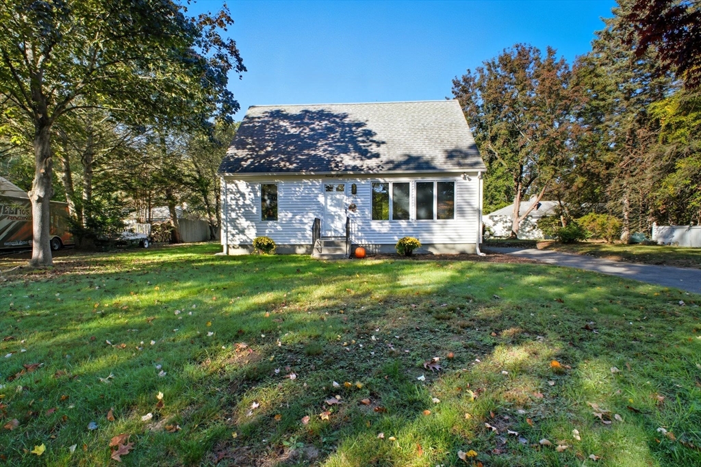 28 Collingwood Road Springfield, MA 01119 - Photo 2 of 32 a front view of house with yard barbeque and outdoor seating