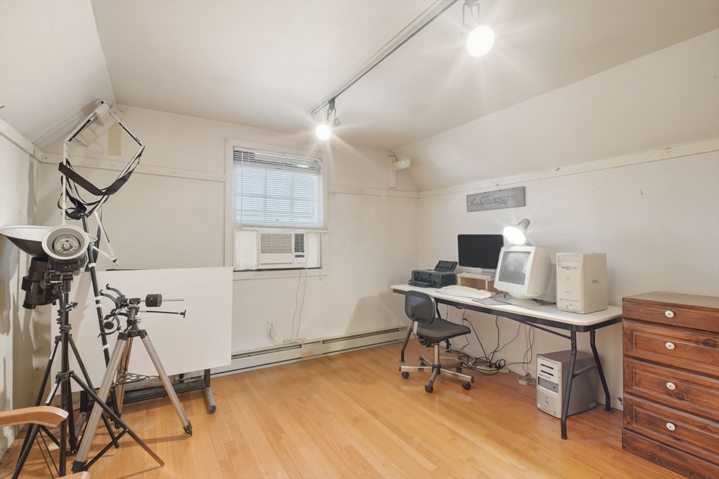 28 Collingwood Road Springfield, MA 01119 - Photo 22 of 32 a view of a workspace with furniture and a window