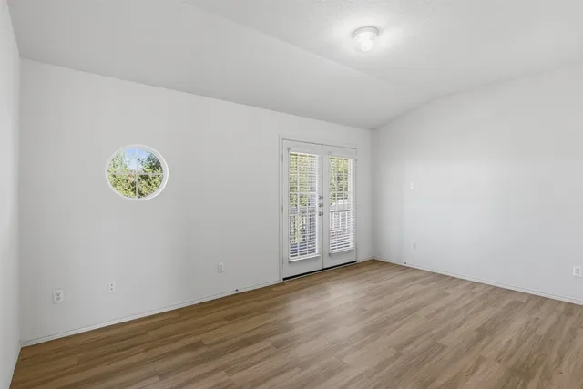 an empty room with windows