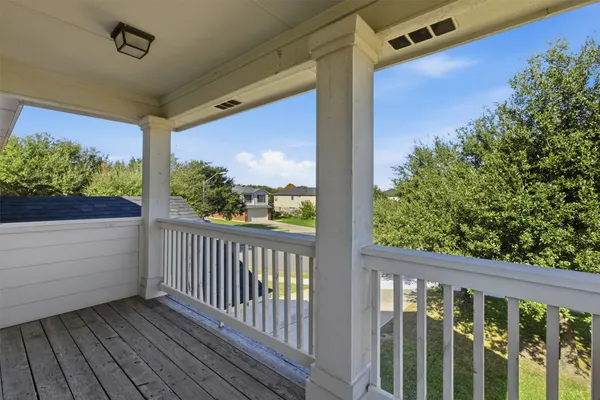 a view of a porch with a yard