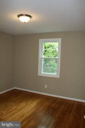 9314 Sudbury Road Silver Spring, MD 20901 - Photo 19 of 30 an empty room with a window