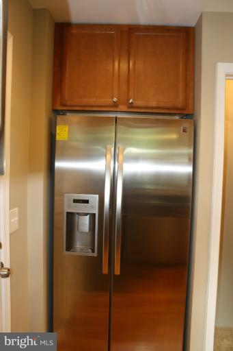 9314 Sudbury Road Silver Spring, MD 20901 - Photo 27 of 30 a view of kitchen with a refrigerator