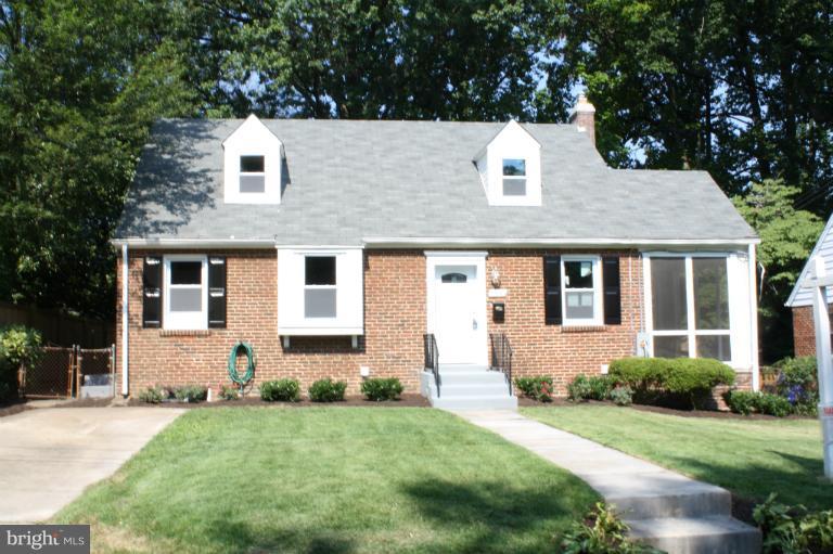 9314 Sudbury Road Silver Spring, MD 20901 - Photo 30 of 30 front view of a house with a yard