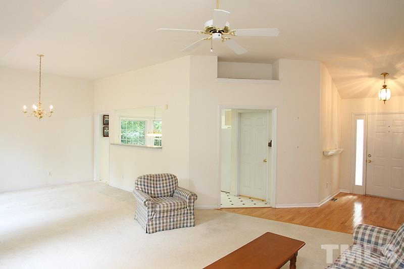 4404 Oakshyre Way Raleigh, NC 27616 - Photo 4 of 19 a bedroom with a bed and cabinets