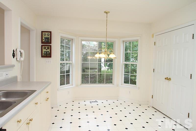4404 Oakshyre Way Raleigh, NC 27616 - Photo 6 of 19 a bathroom with a sink a large mirror and a shower