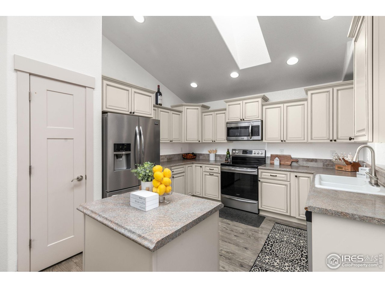 6314 West 14th St Road Greeley, CO 80634 - Photo 10 of 40 Kitchen w Skylights