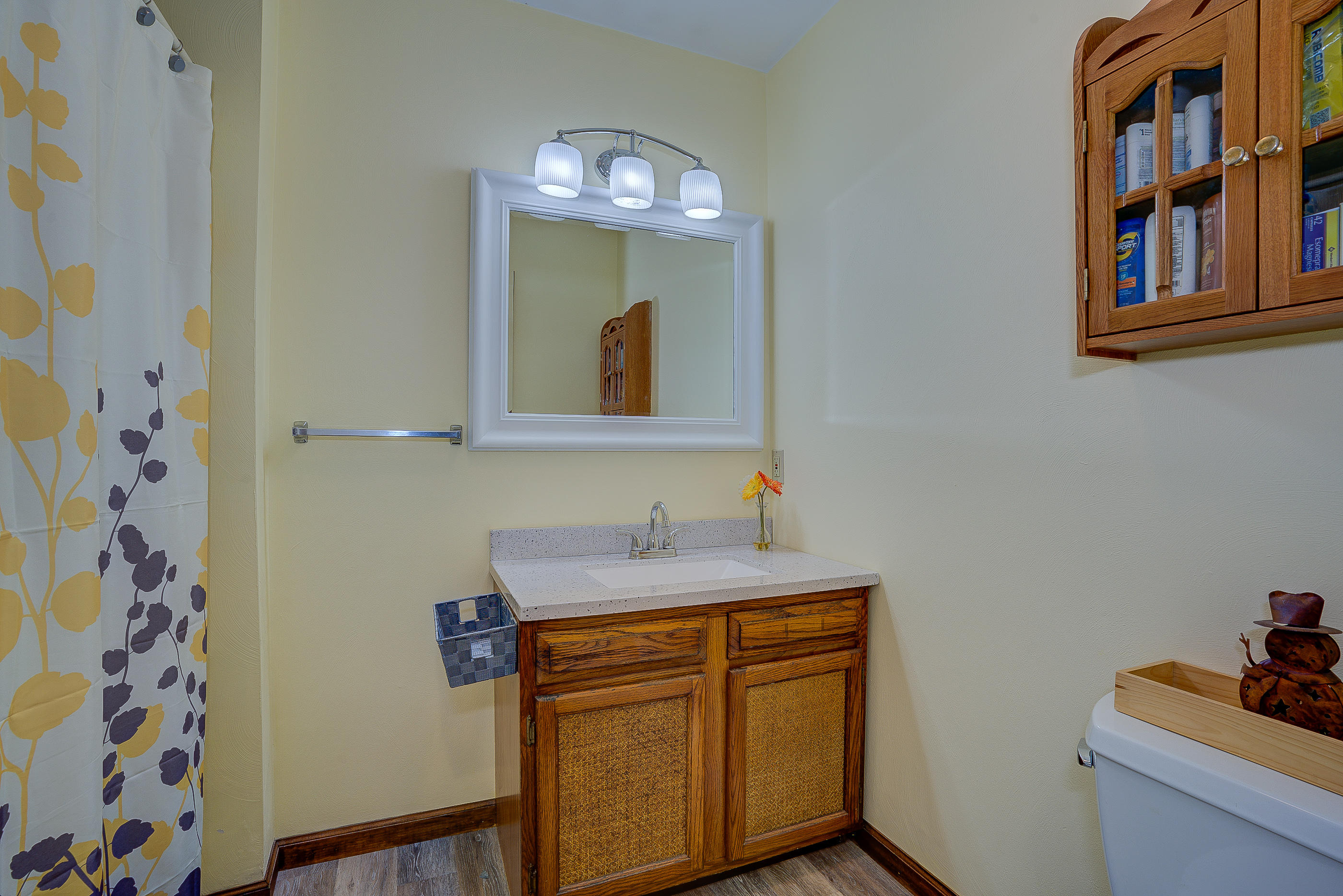 1037 Buck Mountain Road Goodview, VA 24095 - Photo 24 of 31 a bathroom with a sink and a mirror