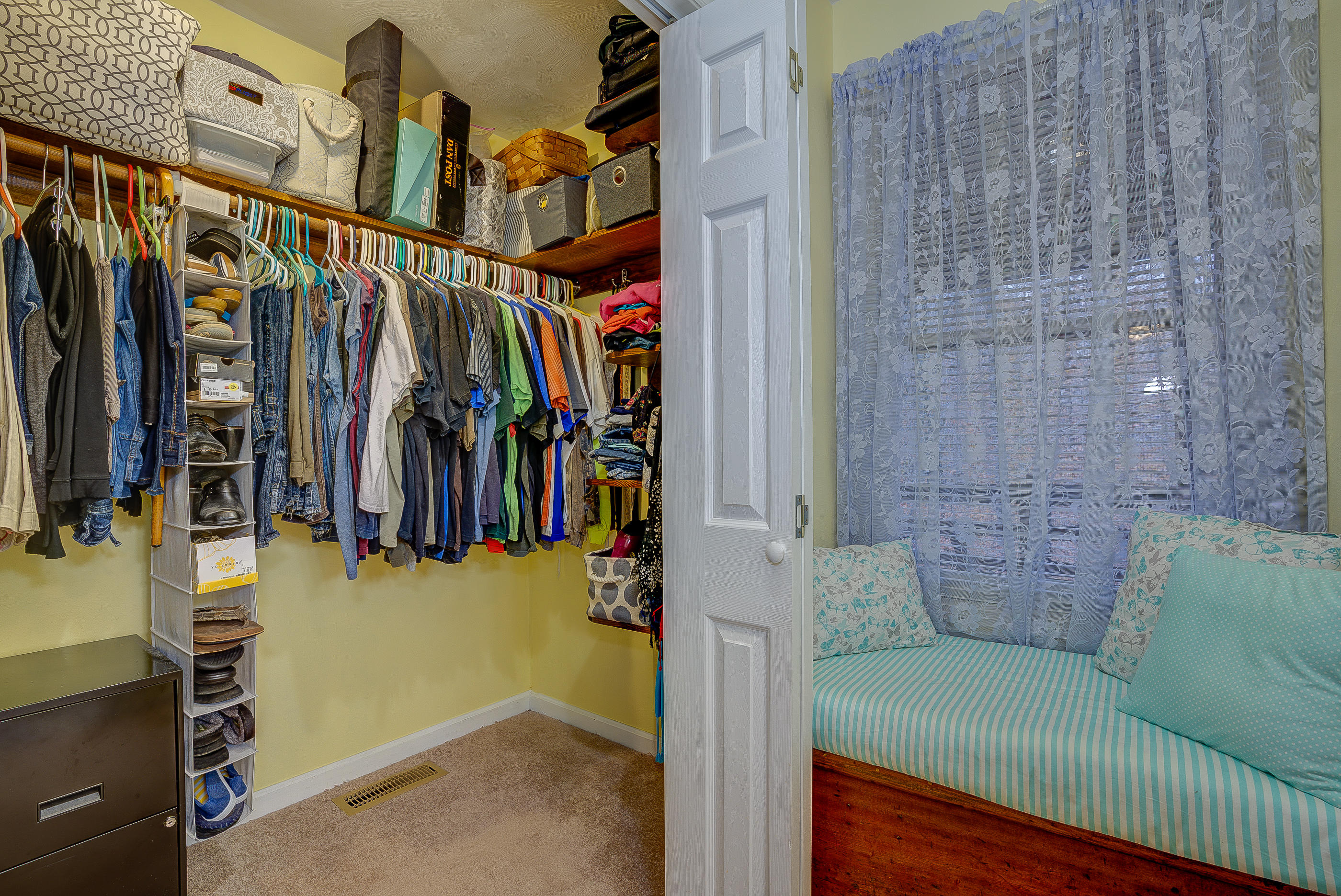 1037 Buck Mountain Road Goodview, VA 24095 - Photo 25 of 31 a view of walk in closet with clothes