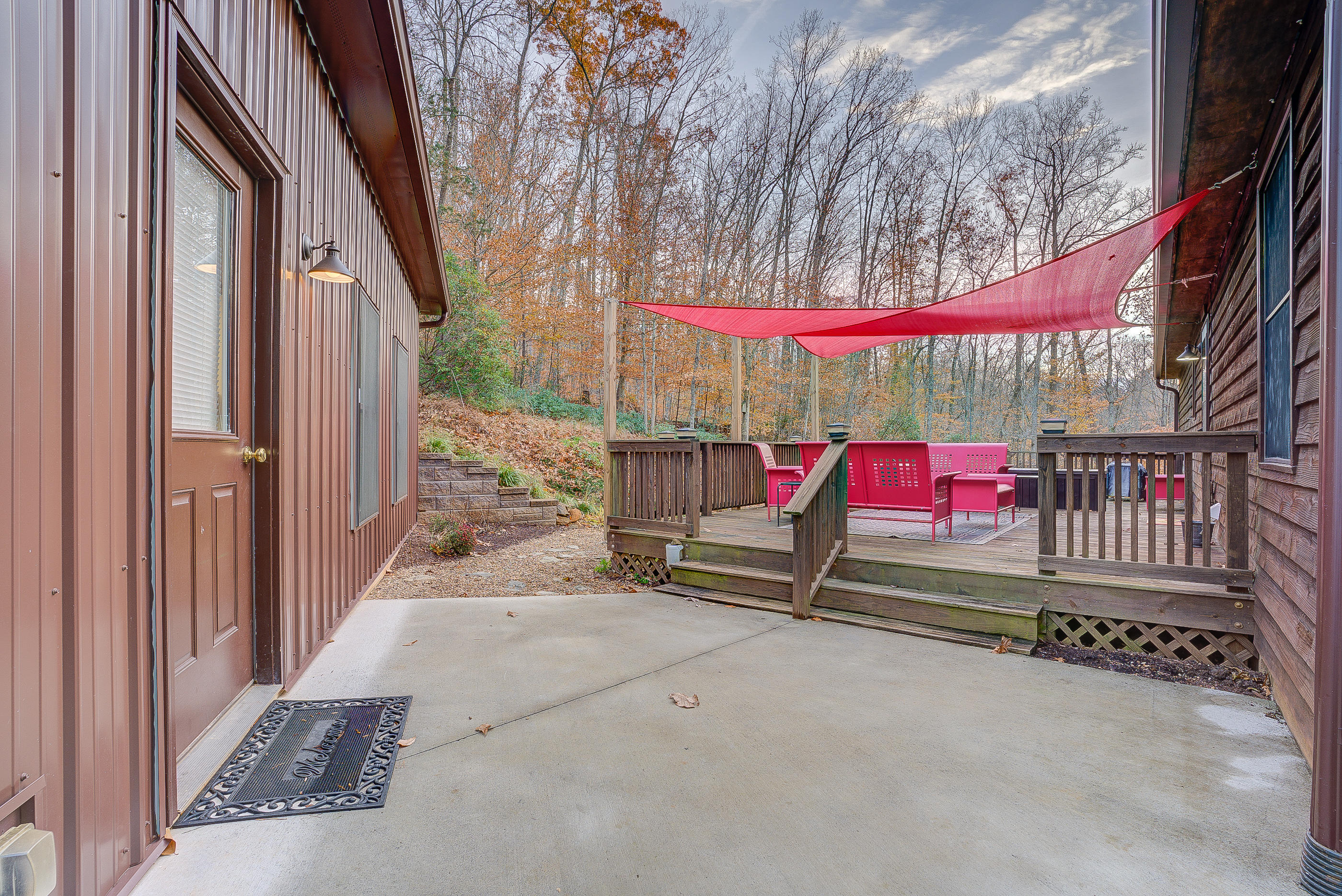 1037 Buck Mountain Road Goodview, VA 24095 - Photo 26 of 31 a view of a patio with table and chairs