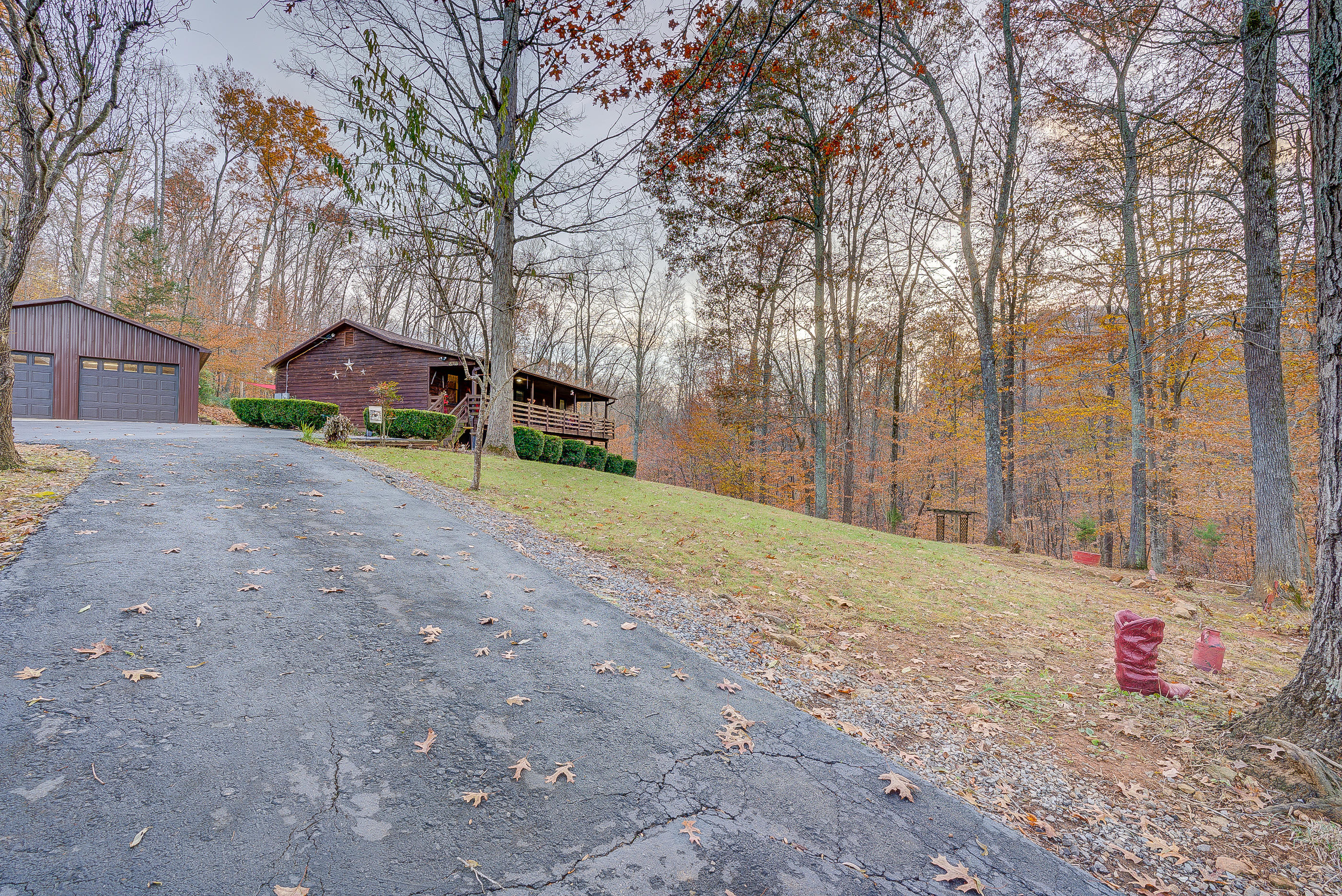 1037 Buck Mountain Road Goodview, VA 24095 - Photo 7 of 31 a house view with a backyard