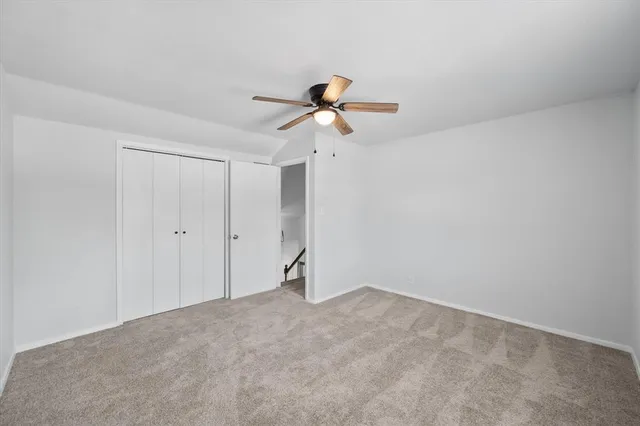 a view of a ceiling fan in a room