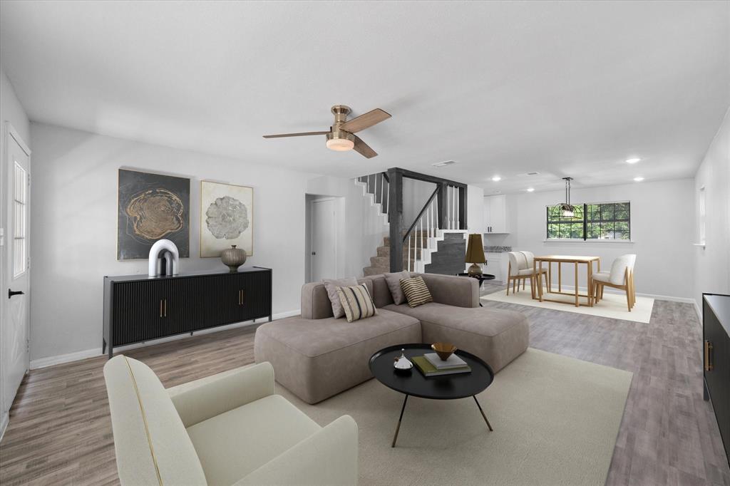 1312 East Collin Street Corsicana, TX 75110 - Photo 2 of 24 a living room with furniture and a wooden floor