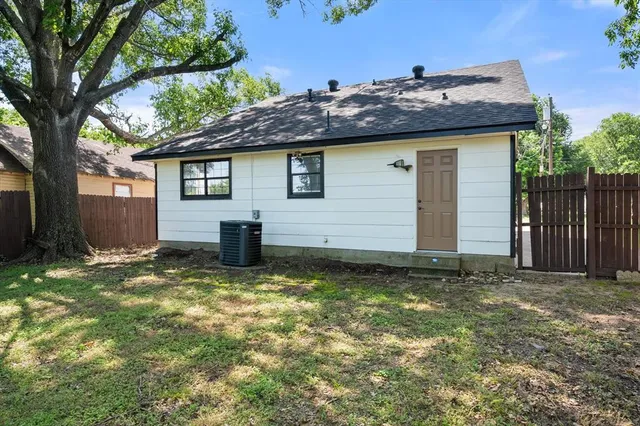 a house with trees in front of it
