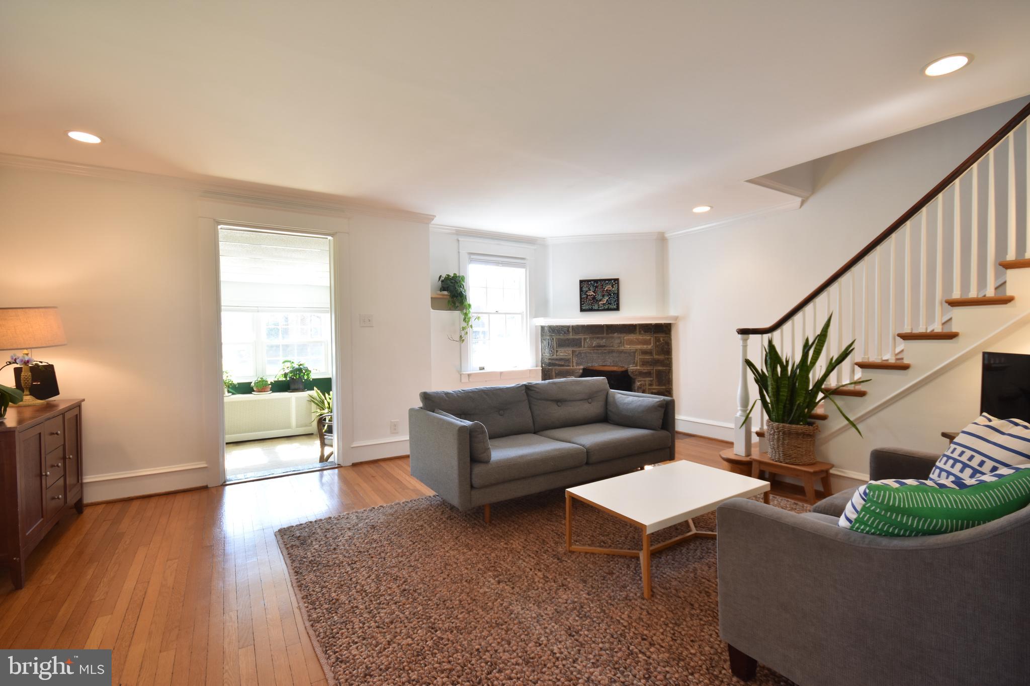 125 Walsh Road Lansdowne, PA 19050 - Photo 4 of 28 a living room with furniture and a wooden floor