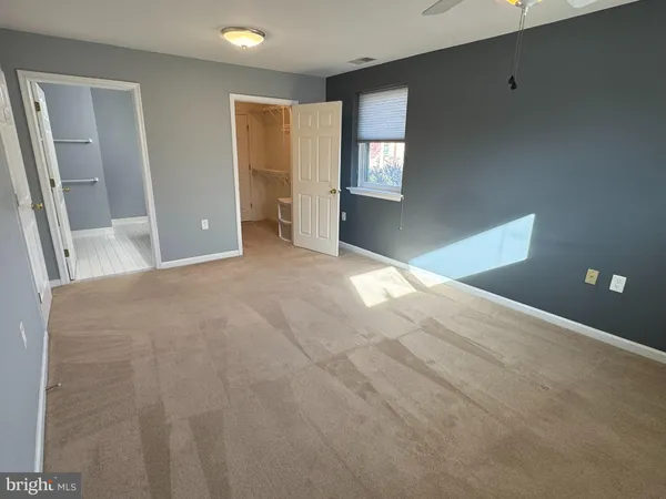 a view of an empty room and window