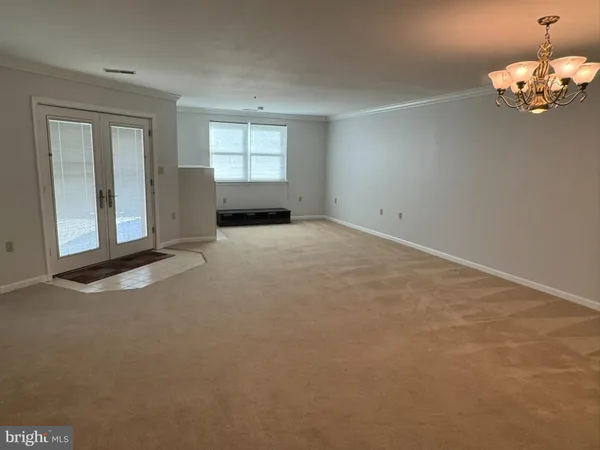 a view of a livingroom with a window