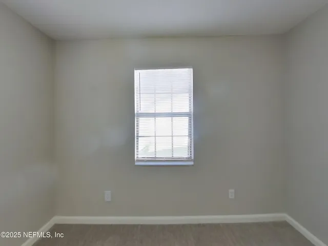 a view of a small space with window