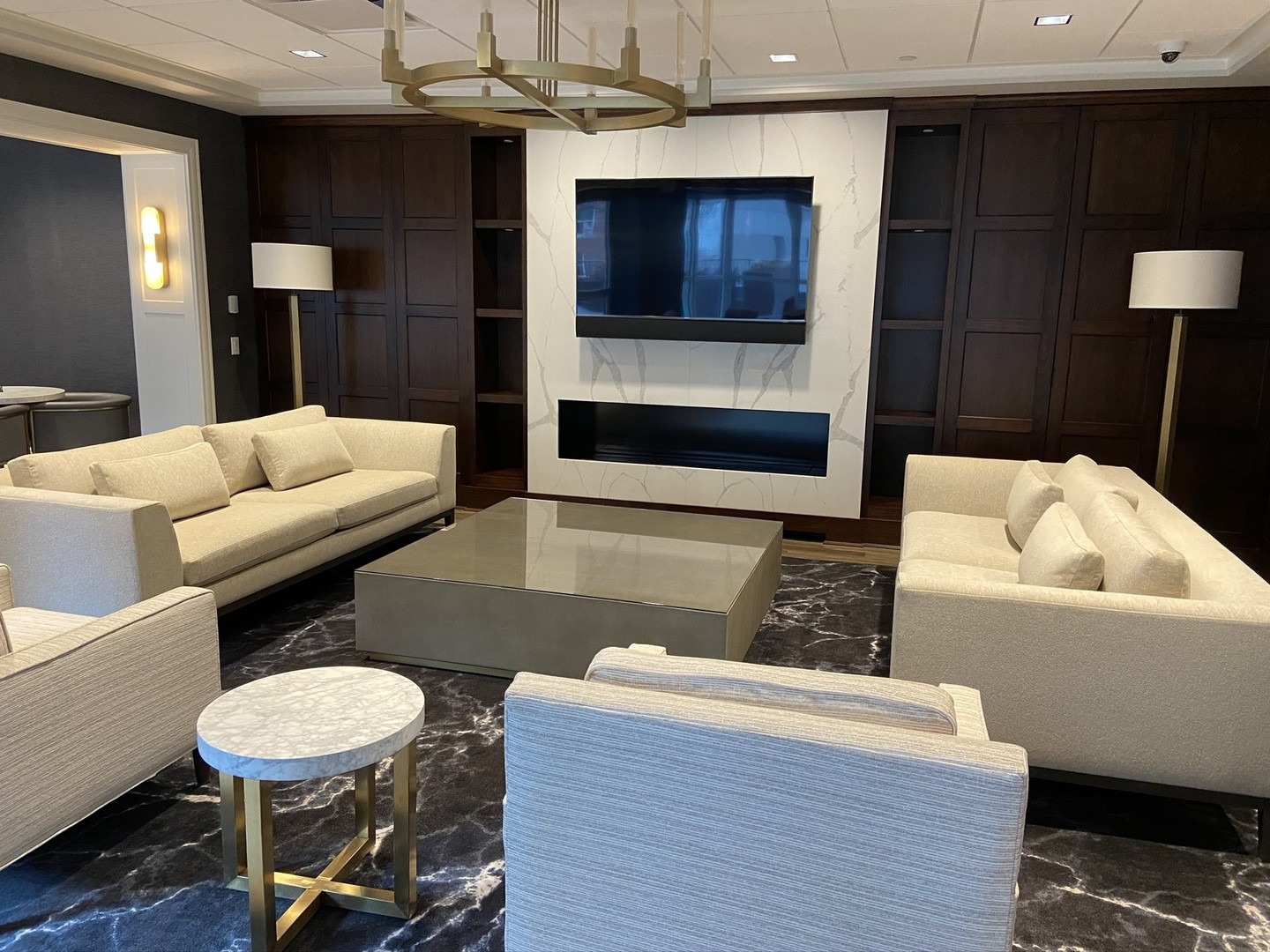 57 East Delaware Place, Unit 3203 Chicago, IL 60611 - Photo 22 of 27 a living room with furniture and a flat screen tv