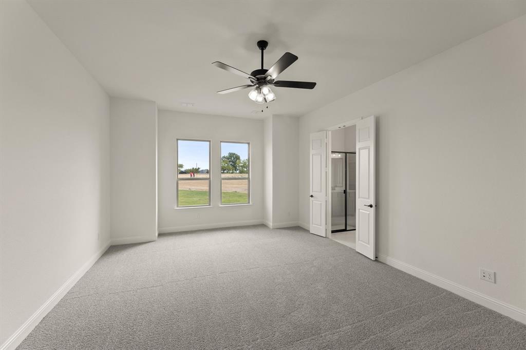 124 Evanston Court Rhome, TX 76078 - Photo 14 of 28 124 Evanston-Primary Suite-1