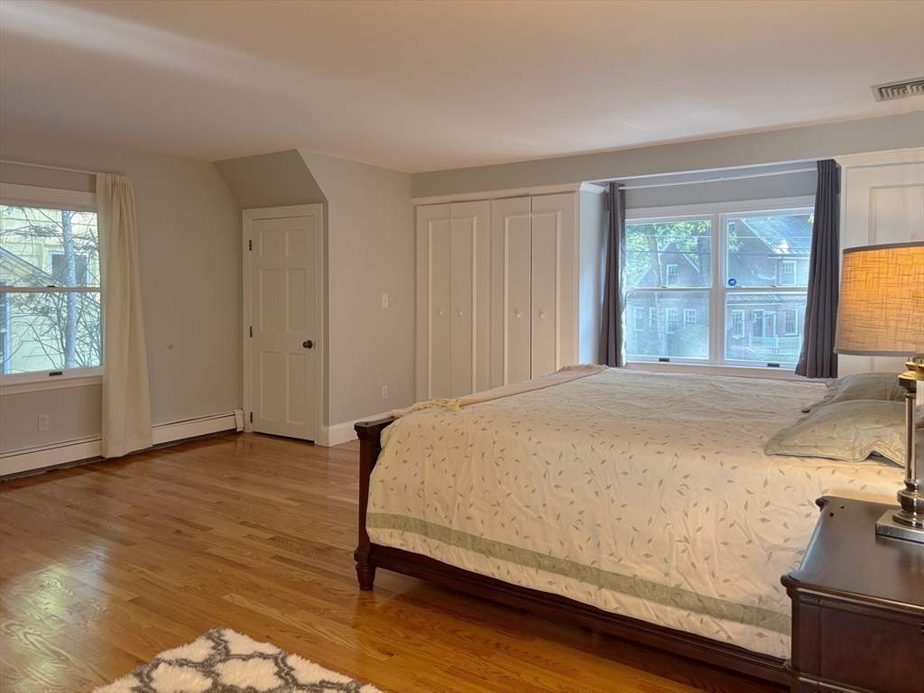 50 Dwhinda Road Newton, MA 02468 - Photo 23 of 42 a bed sitting in a spacious bedroom next to a window