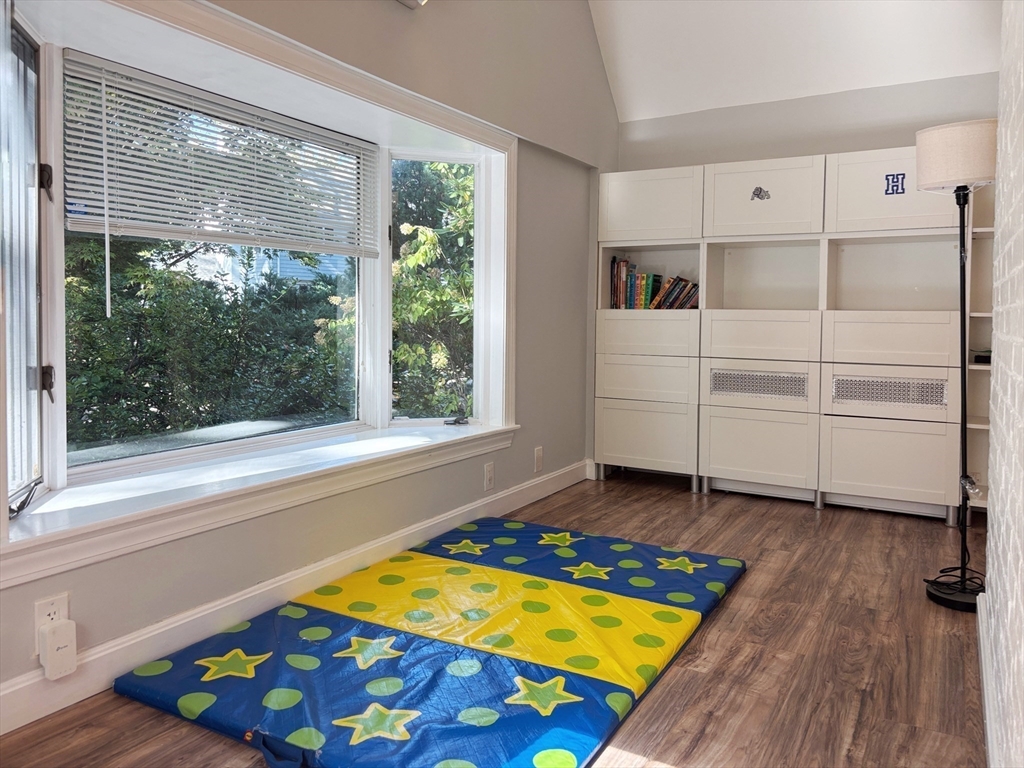 50 Dwhinda Road Newton, MA 02468 - Photo 8 of 42 a view of a living room with furniture and a rug