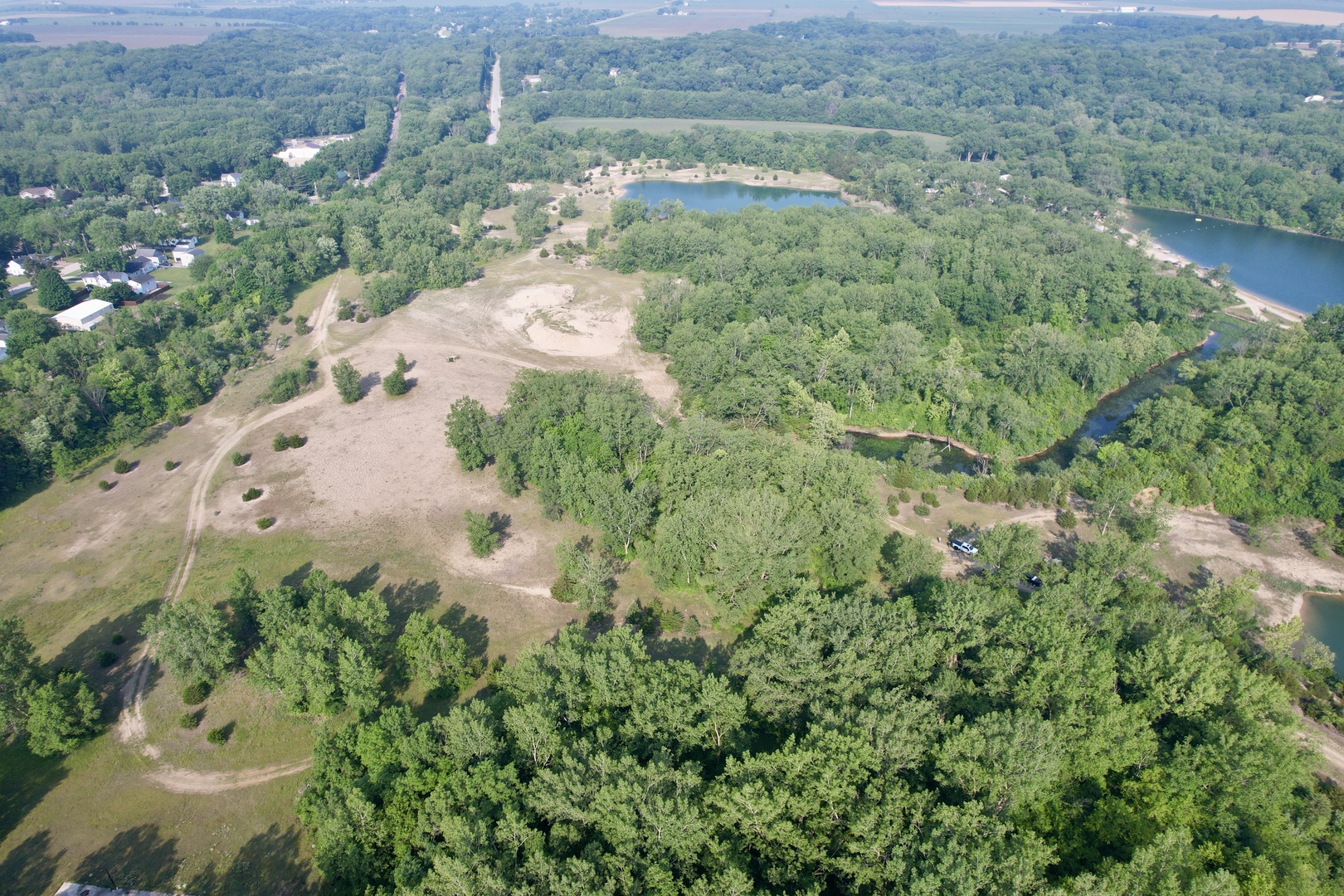 4141 East 2603rd Road Sheridan, IL 60551 - Photo 15 of 48 an aerial view of residential houses with outdoor space and trees