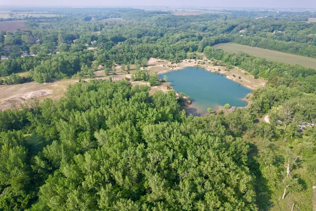 a view of a lake with a yard