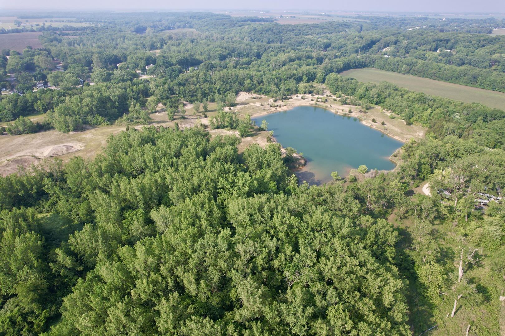 4141 East 2603rd Road Sheridan, IL 60551 - Photo 18 of 48 an aerial view of residential house with outdoor space and trees all around