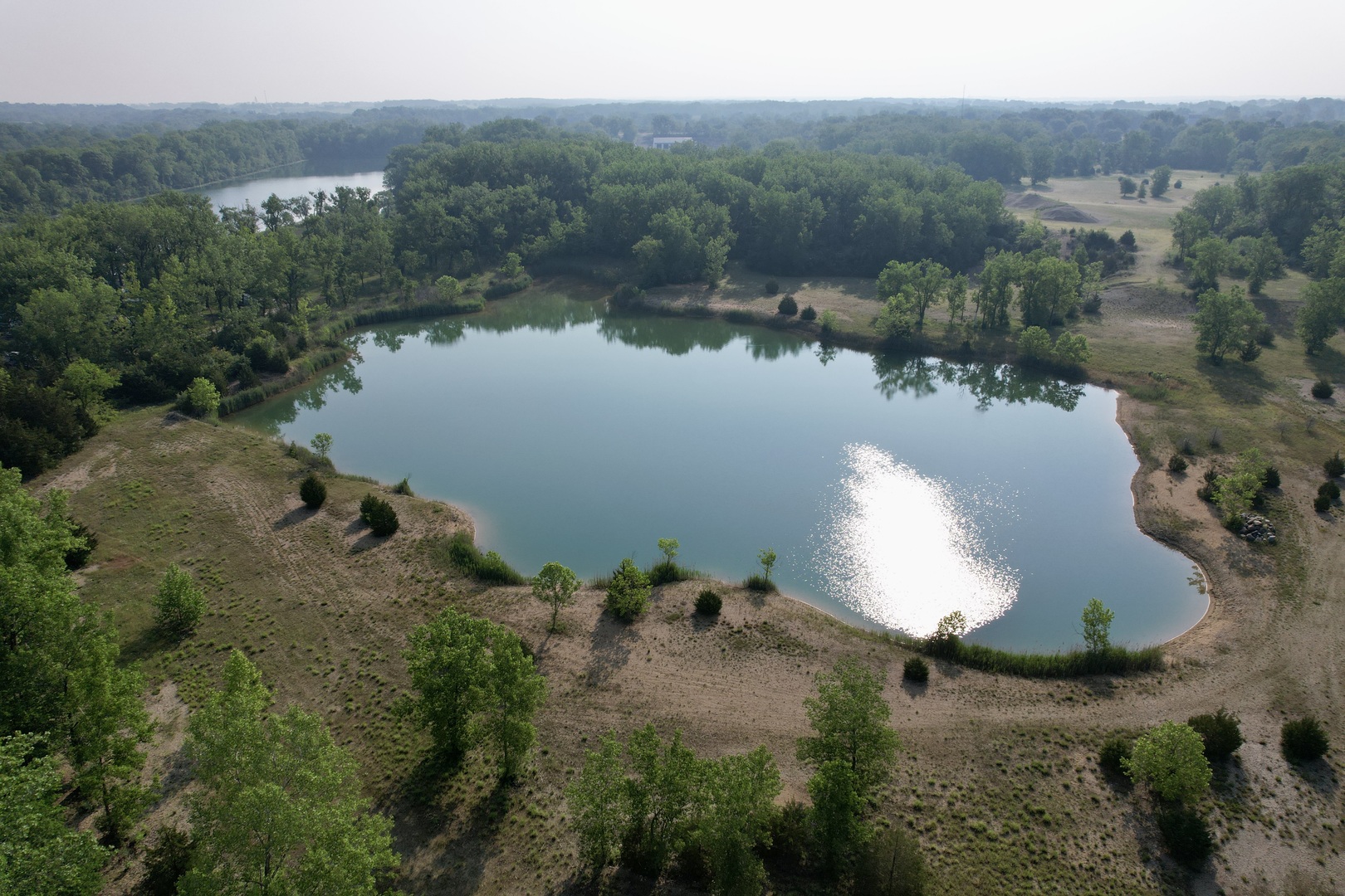 4141 East 2603rd Road Sheridan, IL 60551 - Photo 24 of 48 an aerial view of a house with a yard and lake view