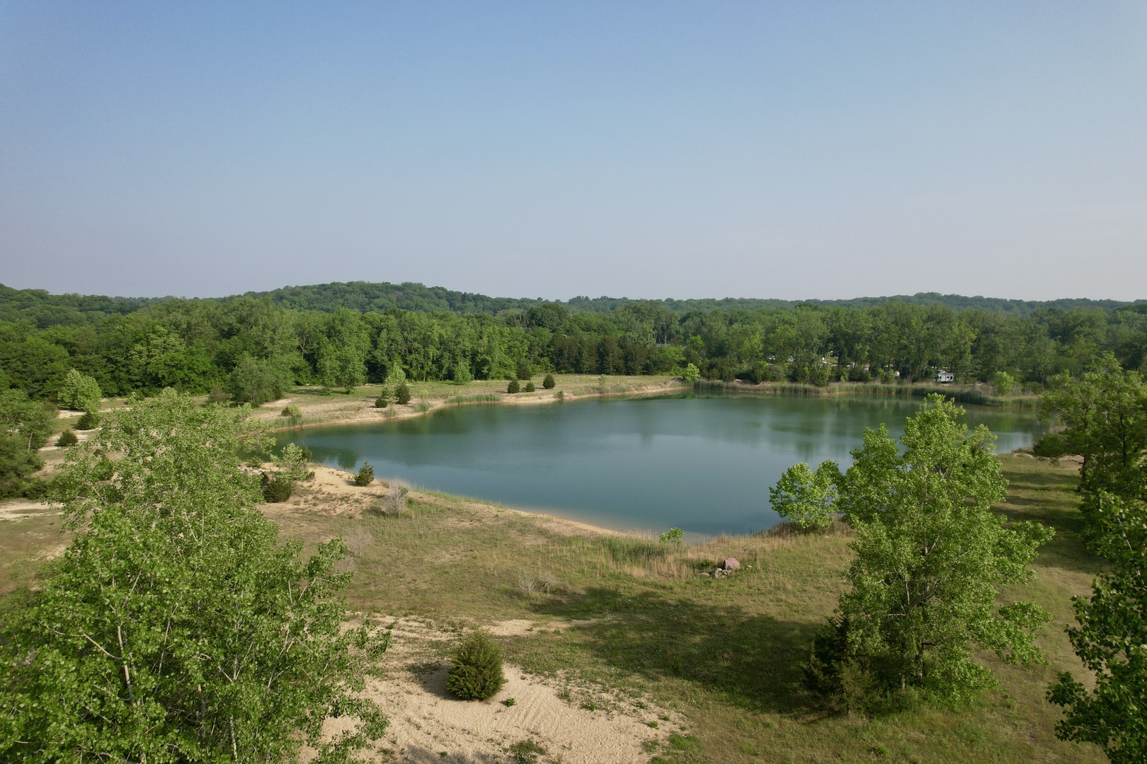 4141 East 2603rd Road Sheridan, IL 60551 - Photo 6 of 48 a view of a lake with houses in background